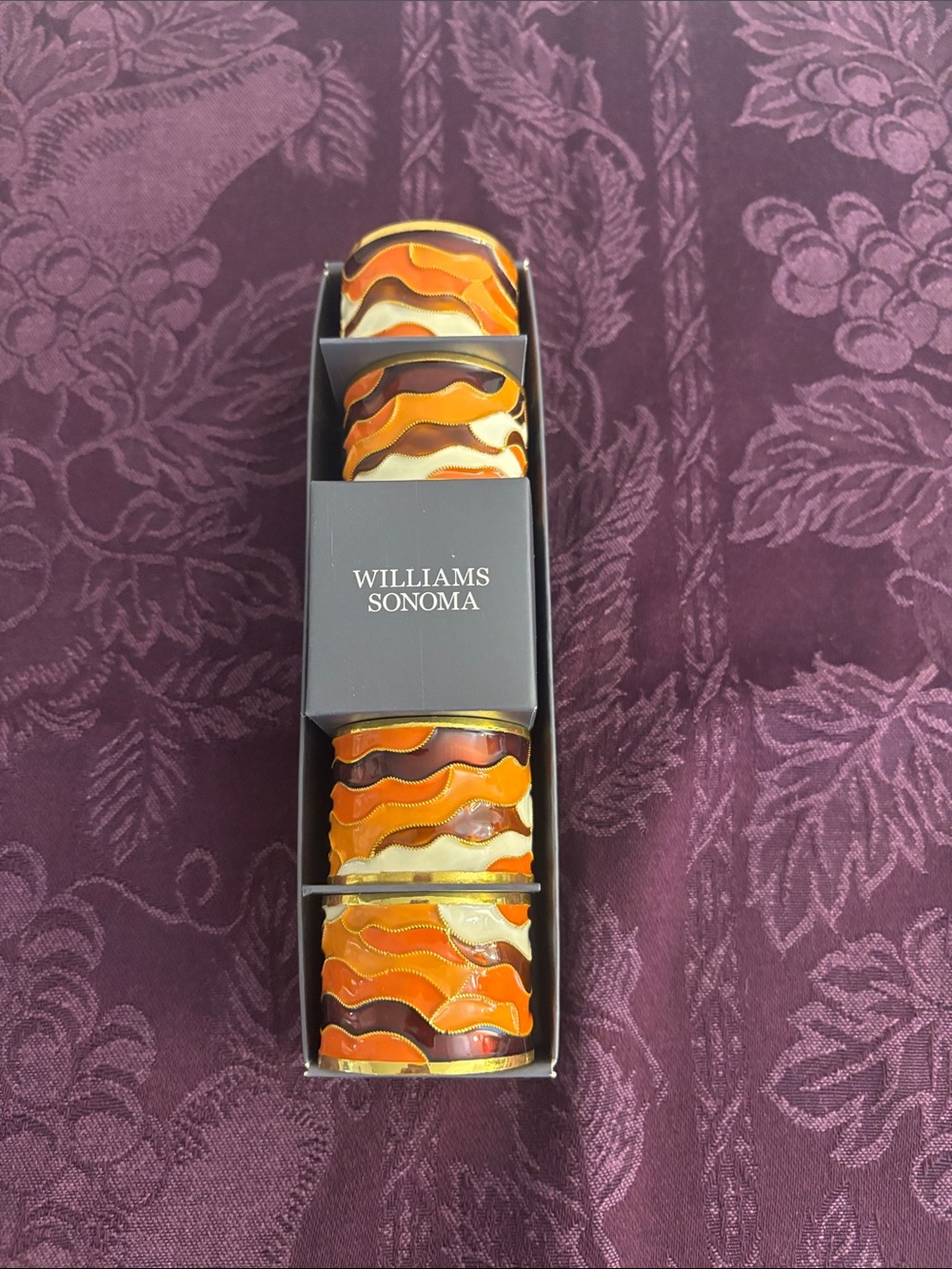 Williams Sonoma Orange, Gold and Brown Glass Napkin Rings (Set of 4)